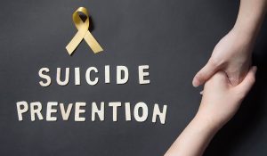 Blog title graphic for The Face of Depression Might Be Smiling, a suicide prevention post about hidden depression, emotional masking, warning signs, and support.